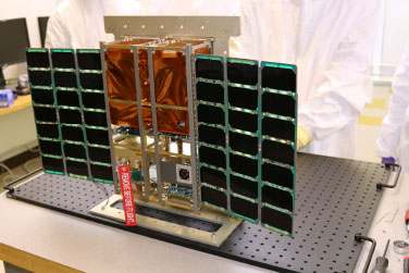 MiniCarb combines NASA's LHR (seen in orange) and Livermore's CubeSat Next-Generation Bus, which consists of all the other components. 