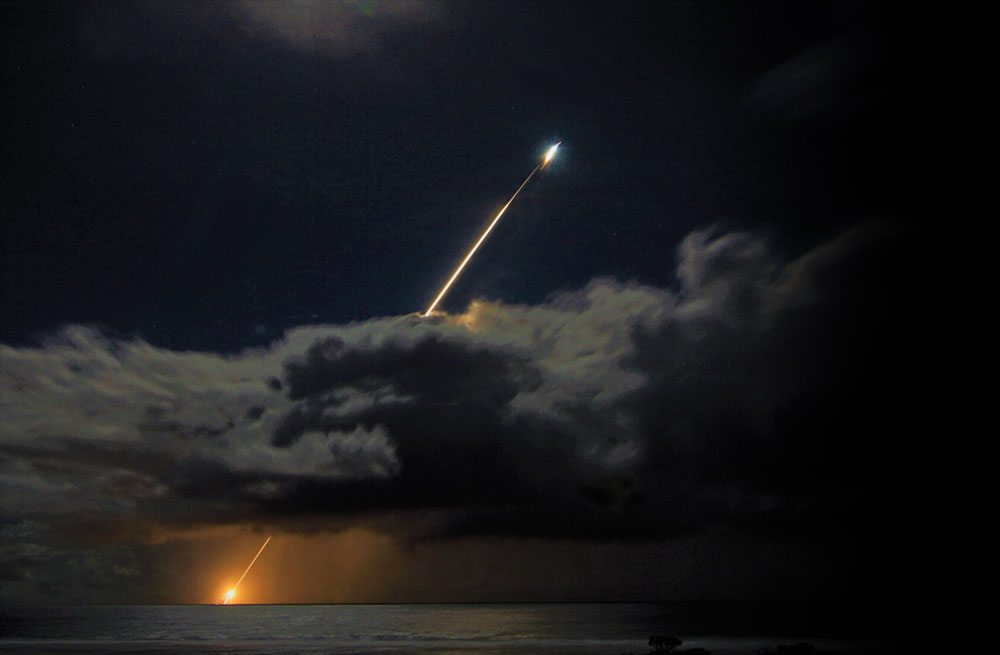rocket launching through clouds