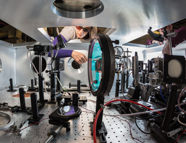 Livermore researchers Félicie Albert (left) and Bradley Pollock prepare the tabletop-sized Callisto laser system for laser-wakefield, high-energy x-ray experiments at the Laboratory’s Jupiter Laser Facility.  