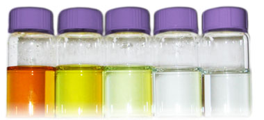 Aqueous solutions made from different coordination compounds display their varying absorption capabilities through color.