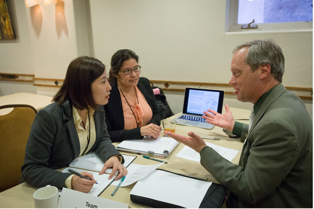 Livermore’s Yongqin Jiao (left) and Suzanne Singer, members of the MicroMiners team for rare-earth recovery, engage with industry expert Tim Heaton as part of the Department of Energy’s Energy I-Corps program. The program pairs national laboratory researchers with industry professionals who can help enhance a technology’s commercial potential.   