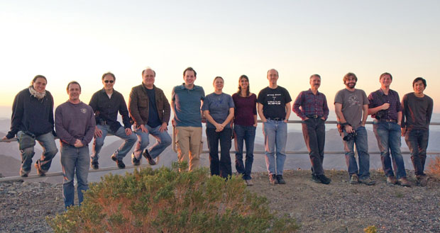 In November 2013, members of the GPI first-light team celebrated when the system acquired its first images. The team includes: (from left to right) Pascale Hibon, Stephen Goodsell, Markus Hartung, and Fredrik Rantakyrö from Gemini Observatory; Jeffrey Chilcote, UCLA; Jennifer Dunn, National Research Council (NRC) Canada Herzberg Institute of Astrophysics; Sandrine Thomas, NASA Ames Research Center; Macintosh; David Palmer, Lawrence Livermore; Dmitry Savransky, Cornell University; Marshall Perrin, Space Telescope Science Institute; and Naru Sadakuni, Gemini Observatory. (Photograph by Jeff Chilcote, UCLA.)